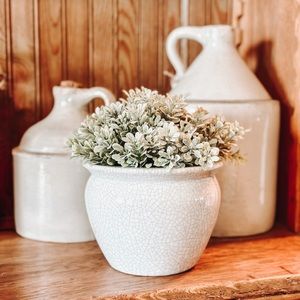 Gray and white glossy planter.